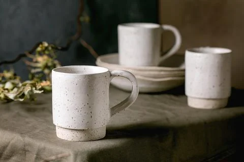 Set of empty craft ceramic coffee cups Stock Photos