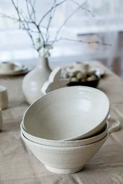 Set of empty craft white ceramic bowls Stock Photos