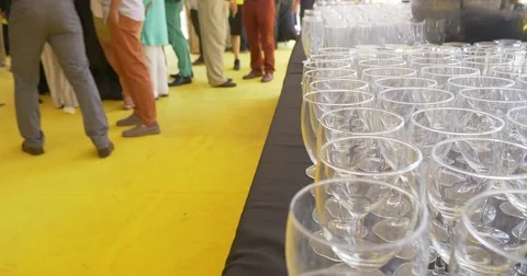 Set of empty drinking glasses cups at elegant party Stock Footage 77872361