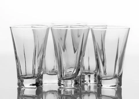 Set of empty glasses isolated on white background Photos