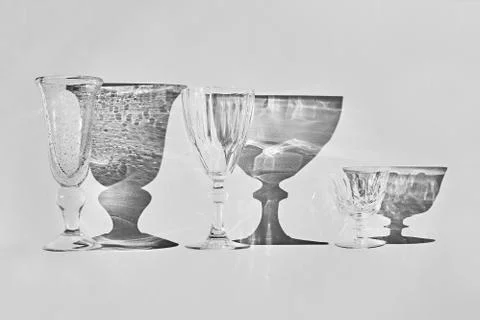 Set of empty glasses with shadows Stock Photos