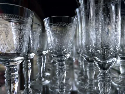 Set of empty glasses on the table indoors. Stock Photos