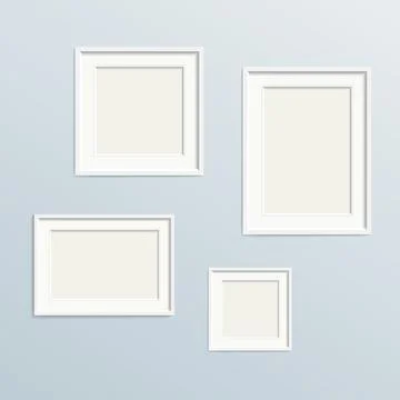 Set of empty picture frames on wall Illustrazione stock