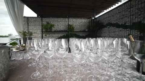 A set of empty transparent wine and champagne glasses on high legs close up Stock-Footage 277060079