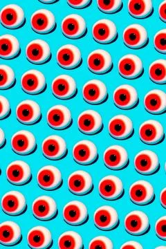 Set of eyeballs on blue background Stock Illustration