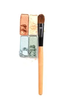 Set of eyeshadow and applicator isolated on white Stock Photos