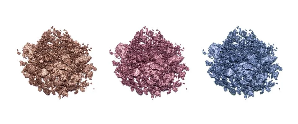 Set of eyeshadow sample isolated on white background. Crushed brown, blue and Stock Photos