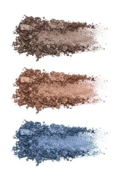 Set of eyeshadow sample isolated on white background. Crushed brown and blue  Stock Photos