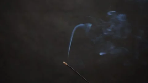 Set a fire of incense stick with smoke. Video stock 164059238
