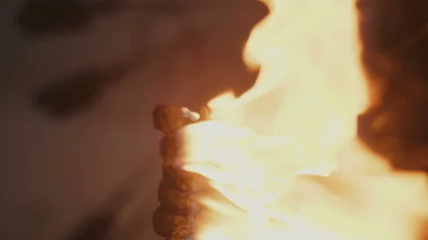 Set fire to a torch with kerosene. slow motion Video stock 114978832