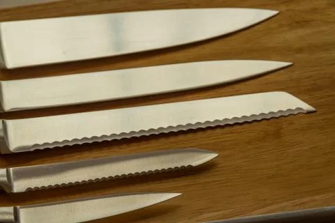 Set of five cooks knives. Stock Photos