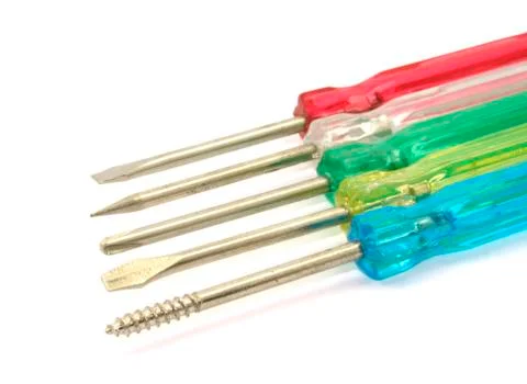 Set of five flathead screwdrivers on white background Stock Photos