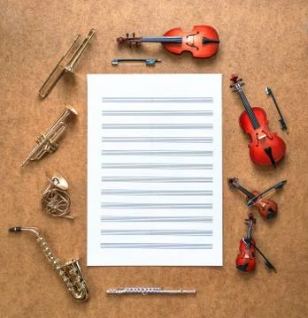 Set of five golden brass wind and four string musical orchestra instruments Stock Photos
