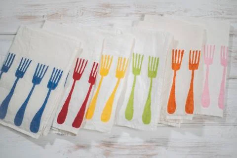 Set of Five White Table Napkins with Dinner Fork Pattern Stock Photos