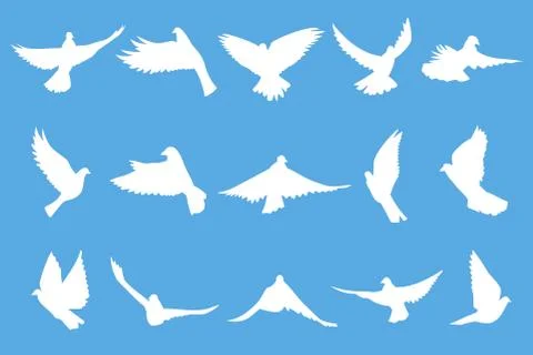 Set of flying doves on blue background Stock Illustration