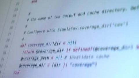 Set of footages of code running over screen and developer editing code Stock Footage 121228595