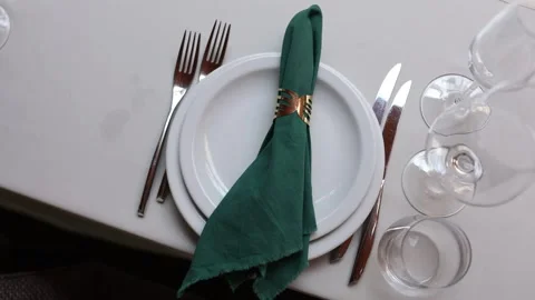 Set of fork knife plate on the table in a restaurant Stock Footage 305859842