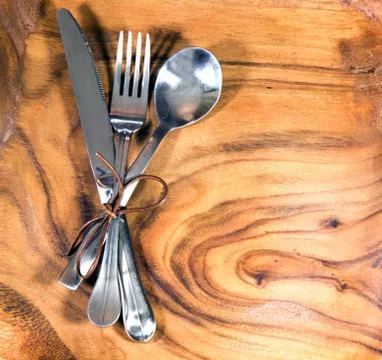 Set of fork, spoon and knife on wooden background 스톡 사진