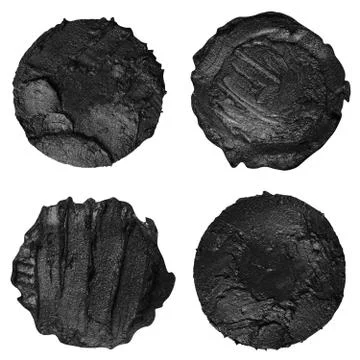 Set of four black paint samples isolated on a white background Stock Photos