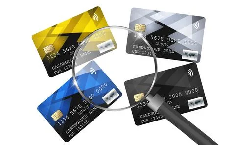 A set of four multi-colored plastic bank and credit cards of different deno.. Illustrazione stock