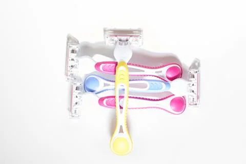 Set of four multi-colored women's shaving razors Stock Photos