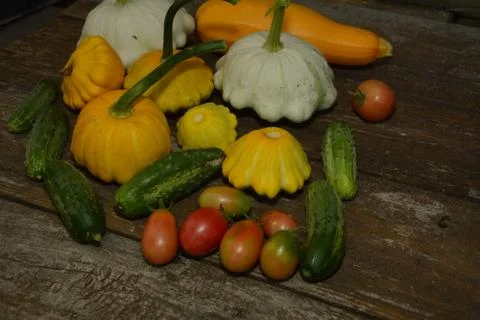 A set of fresh vegetables on a bright kitchen table background Stock Photos