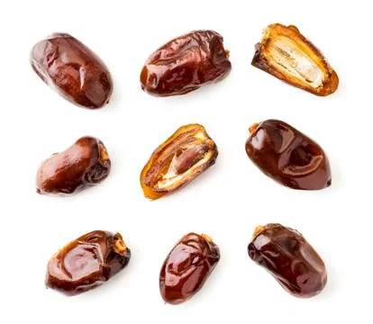 Set of fruit dates and two halves on a white background. The view of top. Stock Photos