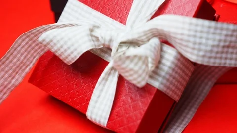 Set of gift boxes of different sizes and colors. Dolly Shot. 4K Stock Footage 121425931