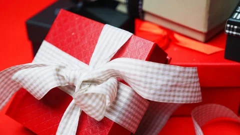 Set of gift boxes of different sizes and colors. Dolly Shot. 4K Stock Footage 121936712