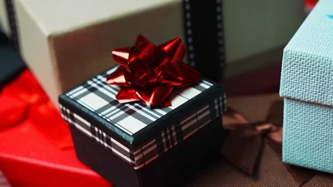 Set of gift boxes of different sizes and colors. Dolly Out Shot from Extreme Stock Footage 128033883