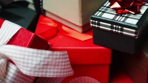 Set of gift boxes of different sizes and colors. Dolly Shot. 4K Stock Footage 145217013