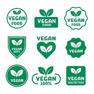 A set of green vegan emblems and badges with text like "VEGAN FOOD" and "10.. Stock Illustration