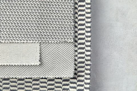 Set of grey fabric samples, texture background. Stock Photos