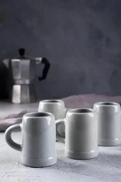 Set of grey rustic coffee cup handcraft and geyser coffee maker Stock Photos