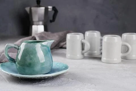 Set of grey rustic coffee cup handcraft and geyser coffee maker Stock Photos