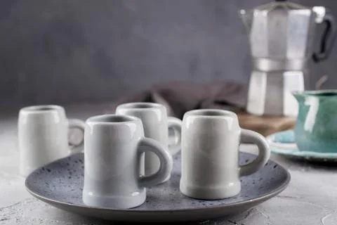 Set of grey rustic coffee cup handcraft and geyser coffee maker Stock Photos