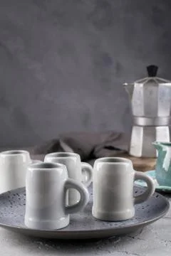 Set of grey rustic coffee cup handcraft and geyser coffee maker Stock Photos
