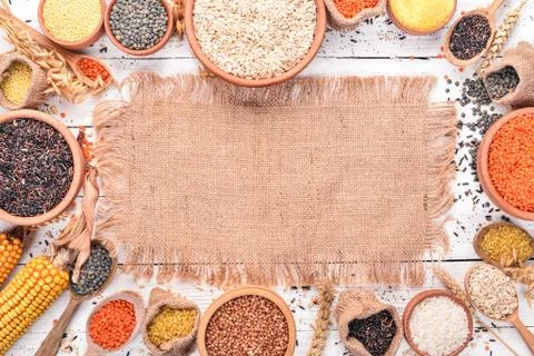 Set of Groats and Grains. Buckwheat, lentils, rice, millet, barley, corn, bla Stock Photos