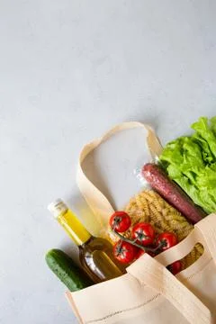 Set of grocery items in a string bag. Home food delivery ordered online. Stock Photos