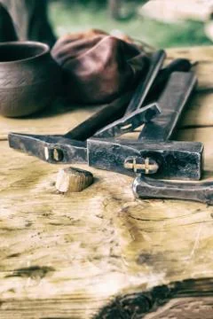 Set of hammers with a black head on the table, a work tool of the master Stock Photos