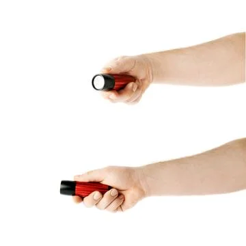 Set of hand holding a flashlight torch, composition isolated over the white Stock Photos