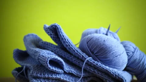 Set for hand knitting, blue yarn, knitting needles. Stock Footage 261585486