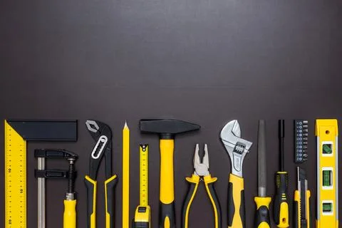 Set of hand tools on a dark background Stock Photos