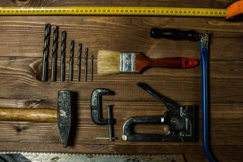 Set of hand tools on a wooden table Stock Photos