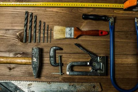 Set of hand tools on a wooden table Stock Photos