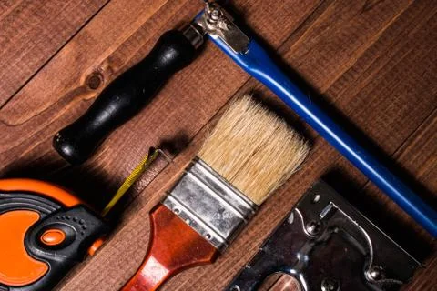 Set of hand tools on a wooden table Stock Photos