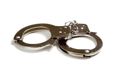 A set of handcuffs on white Stock Photos