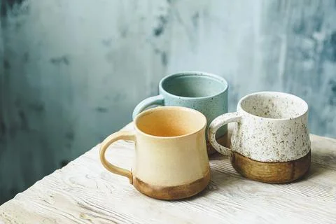 Set of handmade ceramic mugs Photos