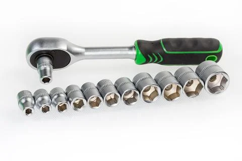 Set of hexagonal sockets different sizes against the ratchet wrench 스톡 사진