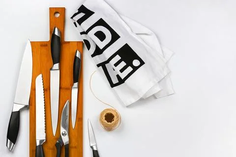 A set of high quality kitchen knives on a cutting board. Various kitchen knives Stock Illustration